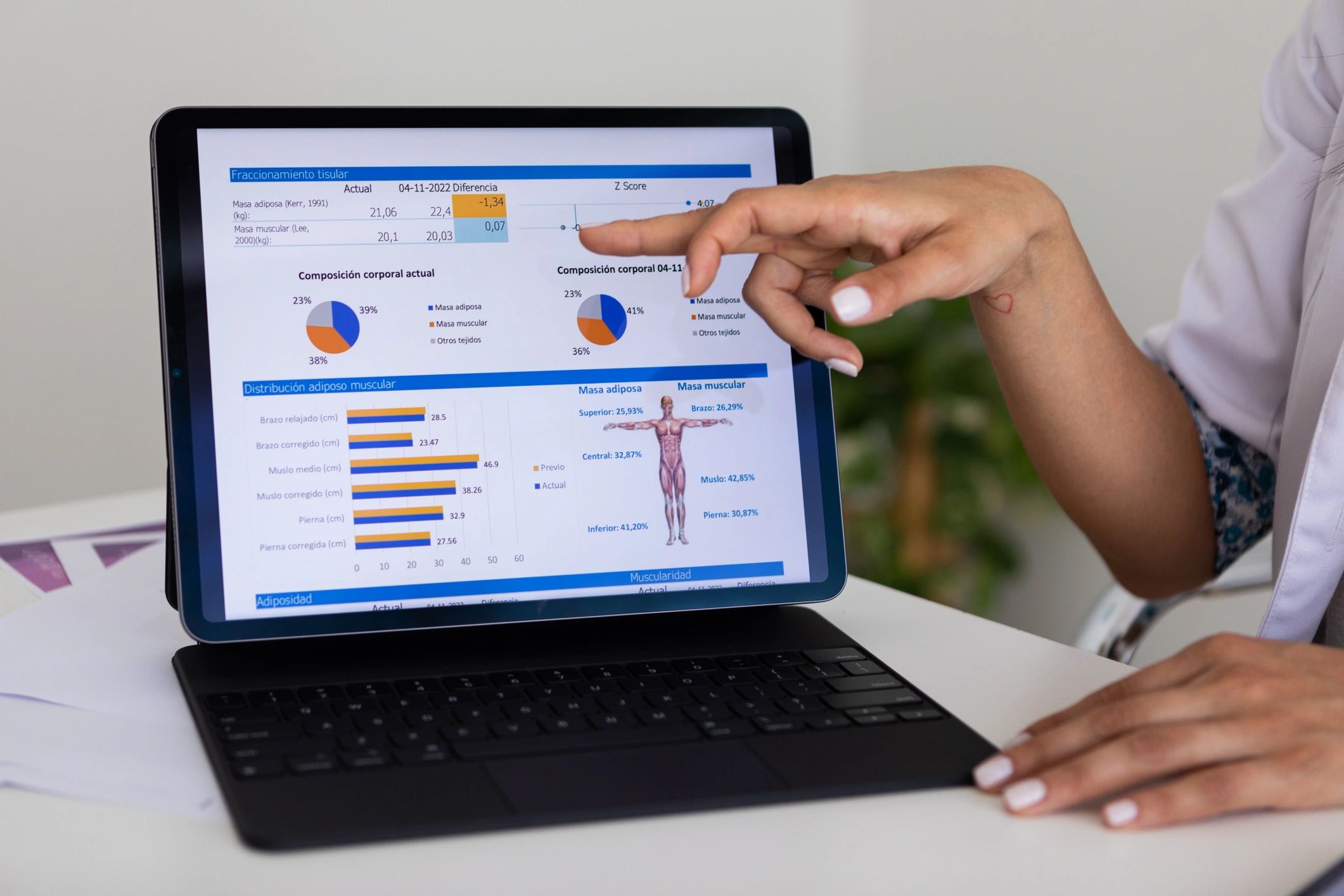 Practitioner reviewing a health assessment on a computer with a client