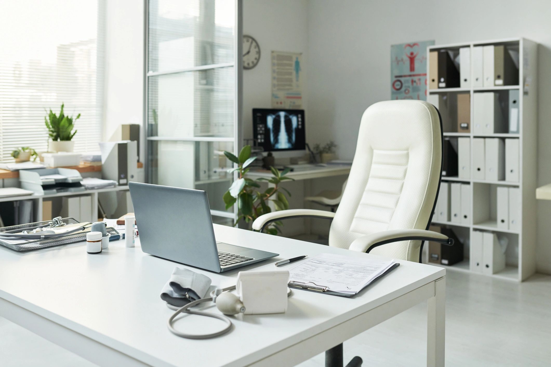 Clinical workstation with diagnostic chart and medical equipment